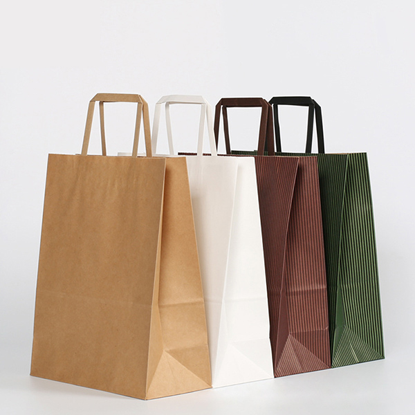 Disposable paper bag with flat handle